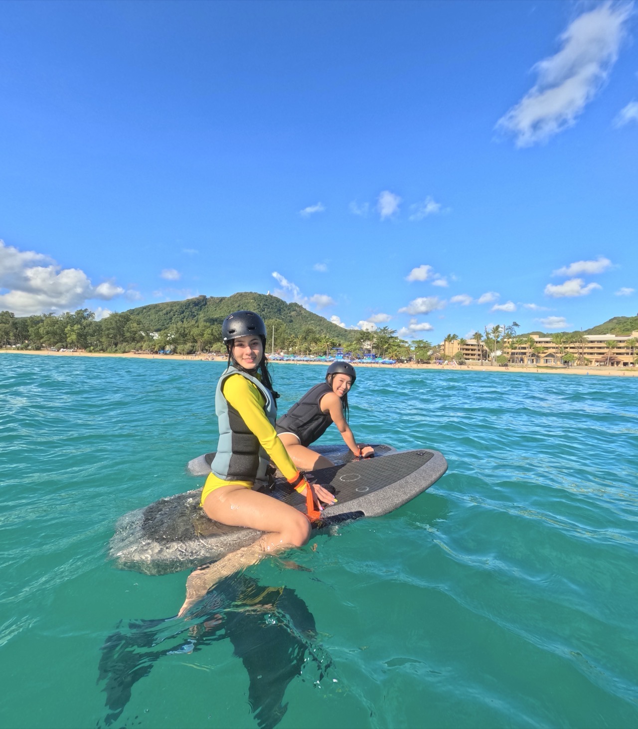 E-foil lesson Koh Phangan — stand-up hydrofoil riding with instructor coaching